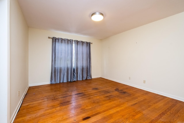 17 Wingate Dr, Little Rock, AR 72205 - empty room featuring wood finished floors and baseboards