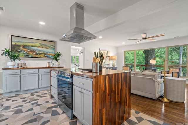 136 Buster Reed Dr, Hot Springs, AR 71913 - kitchen with ventilation hood, stainless steel electric range, wooden counters, gray cabinetry, and light wood finished floors