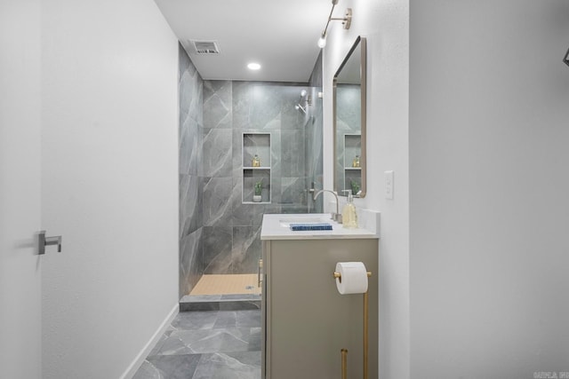 136 Buster Reed Dr, Hot Springs, AR 71913 - full bathroom featuring marble look tiles, tiled shower, vanity, baseboards, and recessed lighting