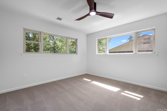 136 Buster Reed Dr, Hot Springs, AR 71913 - spare room featuring carpet floors, a ceiling fan, and baseboards