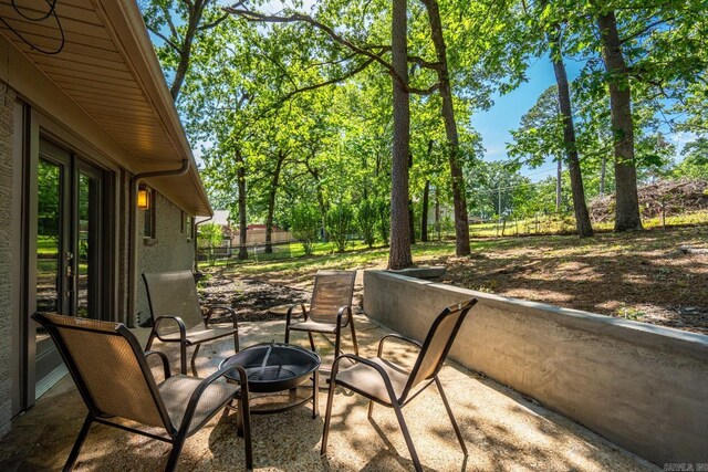 136 Buster Reed Dr, Hot Springs, AR 71913 - balcony with a fire pit and a patio