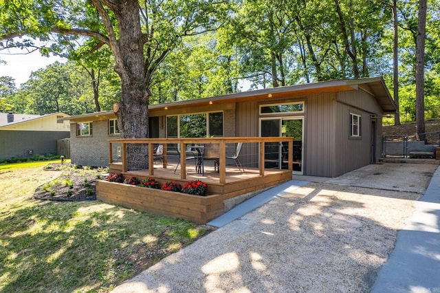 136 Buster Reed Dr, Hot Springs, AR 71913 - view of front of home featuring a wooden deck and brick siding