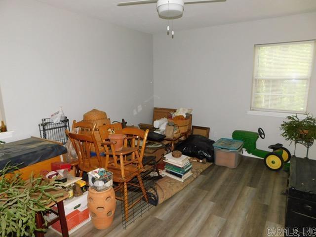 429 E Moore St, Heber Springs, AR 72543 - dining space with ceiling fan and wood finished floors