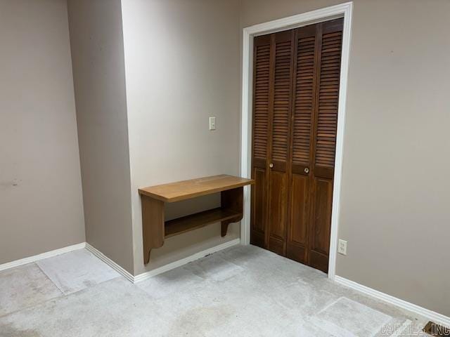 707 E Padgett, El Dorado, AR 71730 - hallway with light colored carpet and baseboards