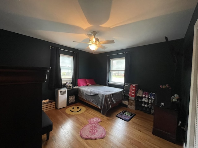 8 Evergreen Ct, Little Rock, AR 72227 - bedroom featuring wood finished floors and a ceiling fan