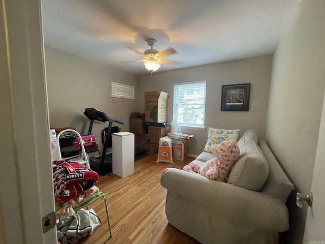 8 Evergreen Ct, Little Rock, AR 72227 - living area featuring light wood-style flooring and ceiling fan