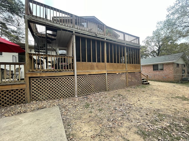 8 Evergreen Ct, Little Rock, AR 72227 - rear view of house featuring stairs and a deck