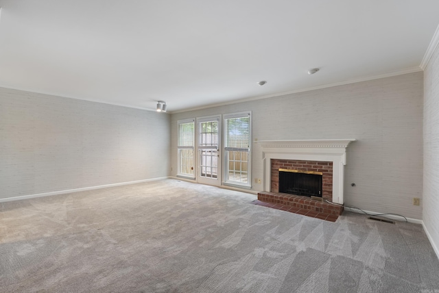 2805 Foxcroft Rd Unit 602, Little Rock, AR 72227 - unfurnished living room with crown molding, carpet floors, a fireplace, and baseboards