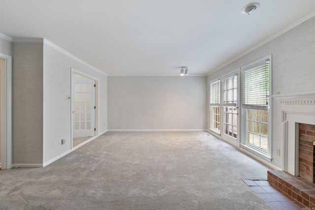 2805 Foxcroft Rd Unit 602, Little Rock, AR 72227 - unfurnished living room featuring crown molding, a brick fireplace, baseboards, and carpet