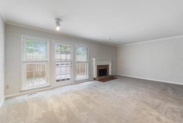 2805 Foxcroft Rd Unit 602, Little Rock, AR 72227 - unfurnished living room featuring plenty of natural light, carpet flooring, baseboards, and ornamental molding