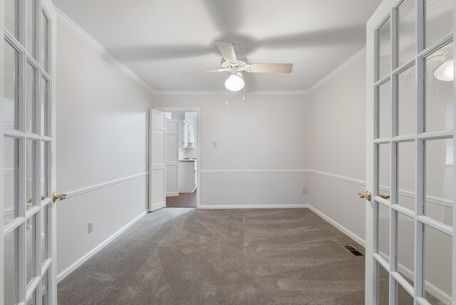 2805 Foxcroft Rd Unit 602, Little Rock, AR 72227 - unfurnished room with french doors, carpet floors, ornamental molding, a ceiling fan, and baseboards