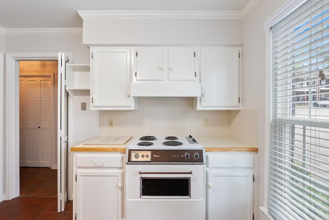 2805 Foxcroft Rd Unit 602, Little Rock, AR 72227 - kitchen with electric stove, white cabinets, light countertops, custom range hood, and crown molding