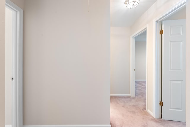 2805 Foxcroft Rd Unit 602, Little Rock, AR 72227 - hall featuring light carpet and baseboards