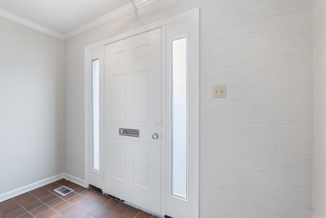 2805 Foxcroft Rd Unit 602, Little Rock, AR 72227 - entryway featuring baseboards, crown molding, and dark tile patterned floors