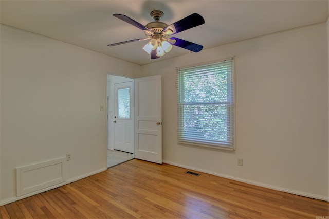 6800 Stamps Ct, Little Rock, AR 72207 - spare room featuring ceiling fan, light wood-style floors, and baseboards