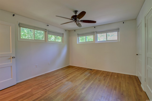 6800 Stamps Ct, Little Rock, AR 72207 - spare room featuring light wood finished floors, ceiling fan, and baseboards