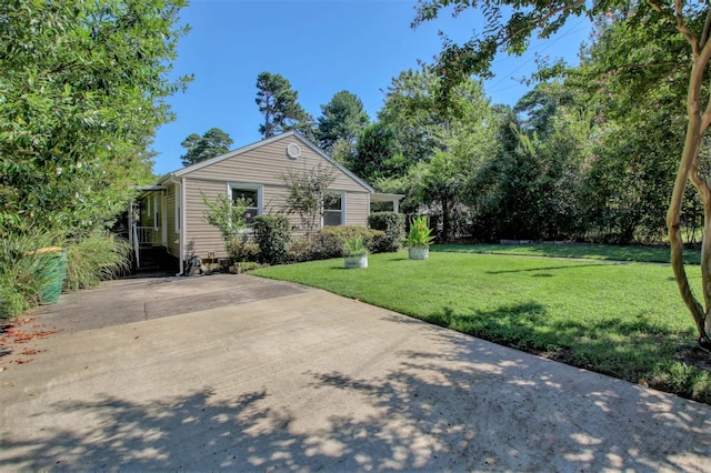 6800 Stamps Ct, Little Rock, AR 72207 - view of home's exterior with a lawn