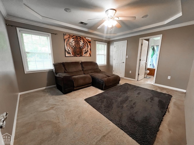 700 Amberwood, Jonesboro, AR 72401 - living room with a tray ceiling, ceiling fan, carpet flooring, baseboards, and crown molding