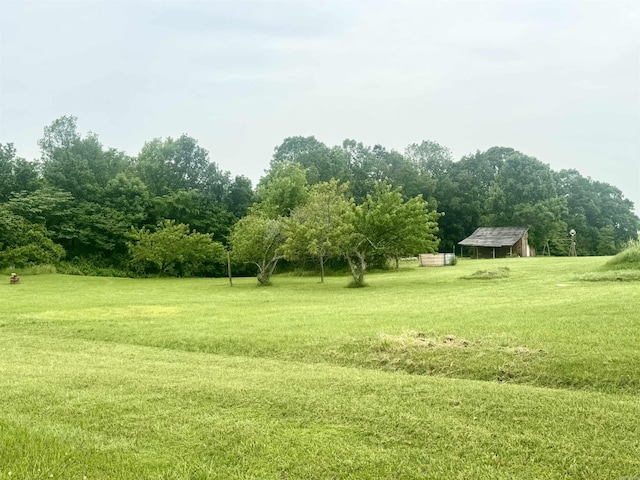 105 Traci Ln, Heber Springs, AR 72543 - view of home's community with a carport, a yard, an outbuilding, and a rural view