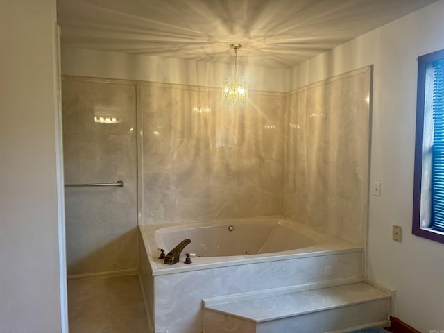 105 Traci Ln, Heber Springs, AR 72543 - bathroom featuring a whirlpool tub and a chandelier