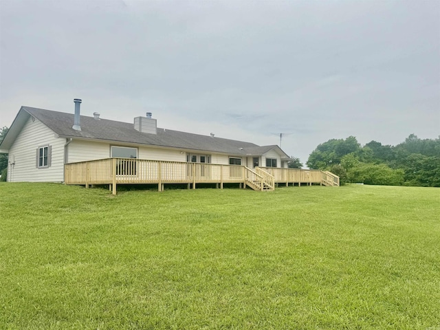 105 Traci Ln, Heber Springs, AR 72543 - rear view of property featuring a yard, a wooden deck, and a chimney