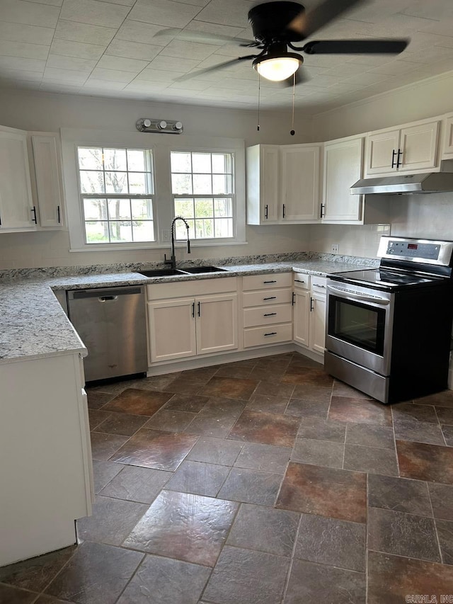 601 N Hickory, Searcy, AR 72143 - kitchen featuring appliances with stainless steel finishes, a sink, under cabinet range hood, a ceiling fan, and white cabinets