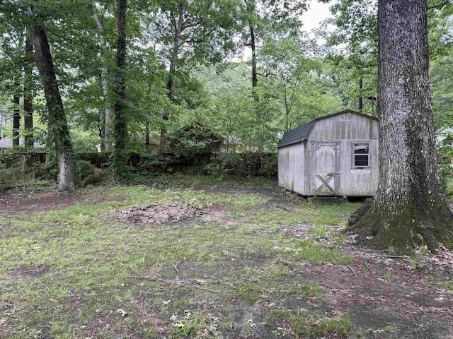 802 Desoto Pl, Benton, AR 72015 - view of yard featuring a storage shed and an outbuilding