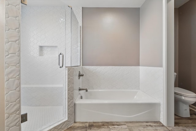 19 Golden Oaks Cv, Maumelle, AR 72113 - bathroom with wood finished floors, toilet, a shower stall, and a bath