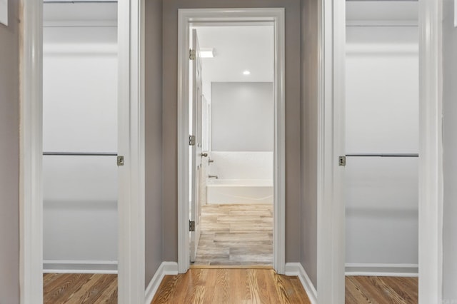 19 Golden Oaks Cv, Maumelle, AR 72113 - corridor with wood finished floors and baseboards