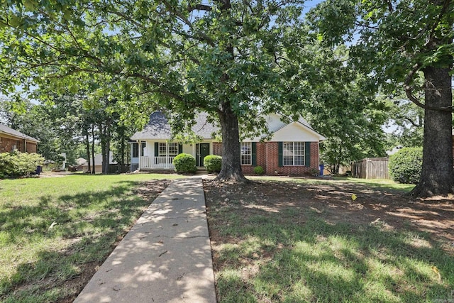 19 Golden Oaks Cv, Maumelle, AR 72113 - view of front of house with brick siding and a porch