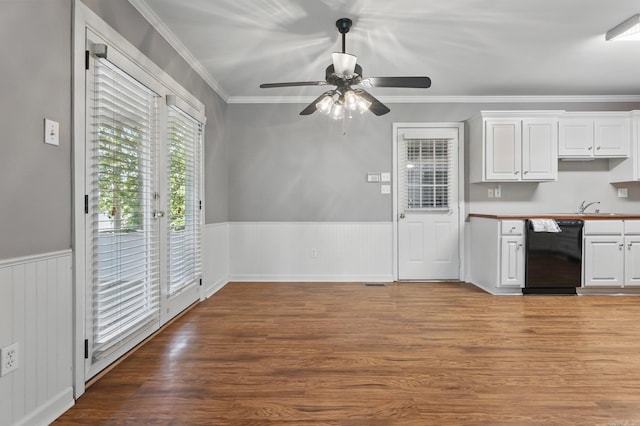 19 Golden Oaks Cv, Maumelle, AR 72113 - kitchen with black dishwasher, wainscoting, white cabinetry, a ceiling fan, and ornamental molding