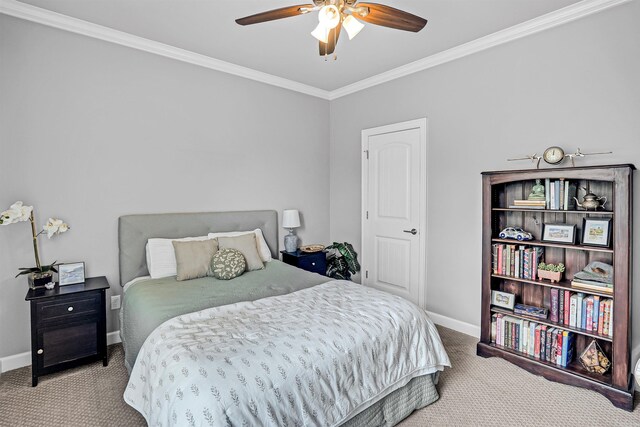 9224 Meadow Gardens Cir, Sherwood, AR 72120 - carpeted bedroom with baseboards, ornamental molding, and a ceiling fan