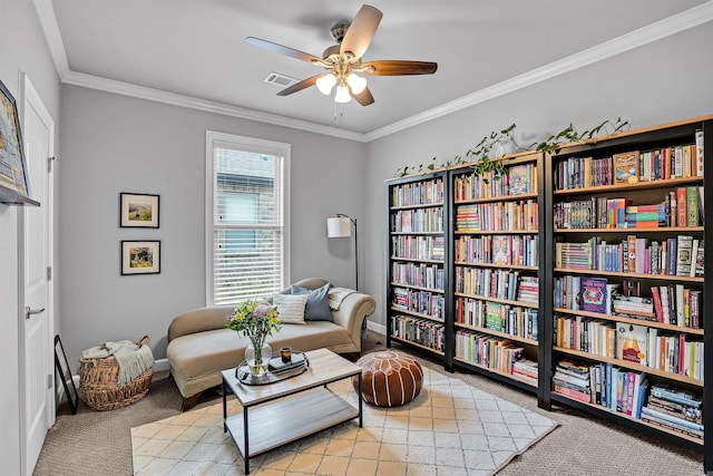 9224 Meadow Gardens Cir, Sherwood, AR 72120 - sitting room featuring carpet floors, ceiling fan, ornamental molding, and baseboards