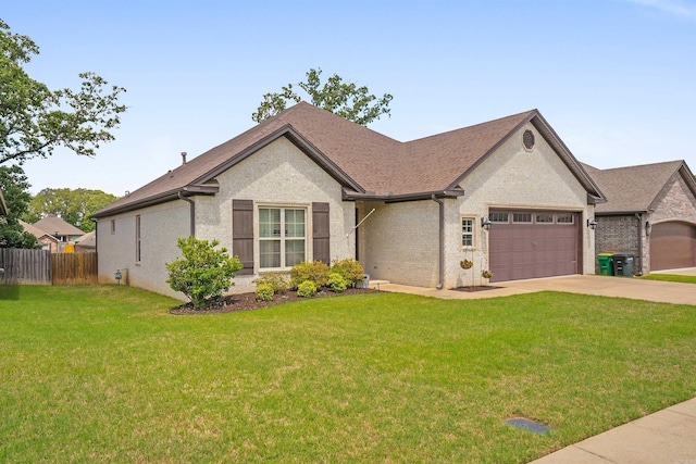 9224 Meadow Gardens Cir, Sherwood, AR 72120 - view of front facade featuring brick siding, an attached garage, driveway, and roof with shingles