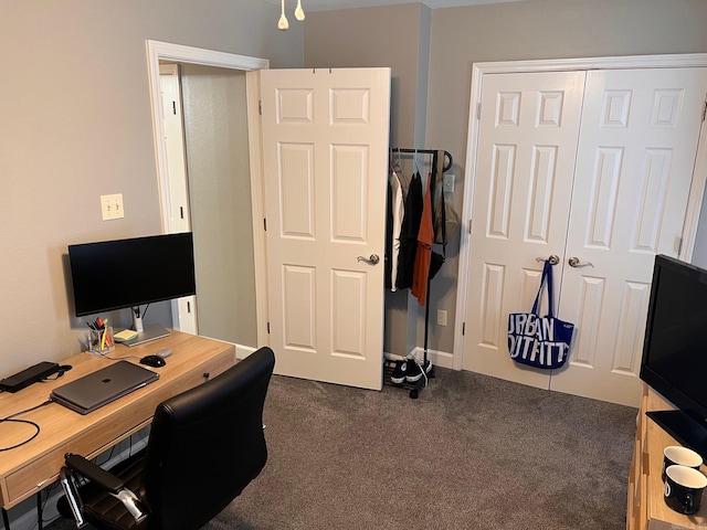 office area featuring dark carpet