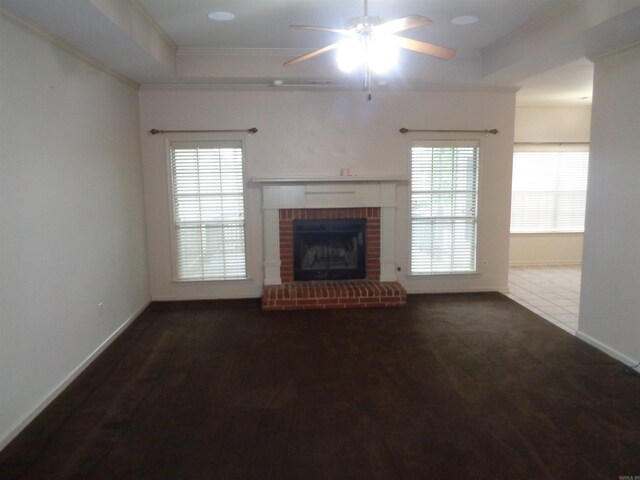 6 Jack Nicklaus Cv, Little Rock, AR 72210 - unfurnished living room featuring ornamental molding, a ceiling fan, a fireplace, and baseboards