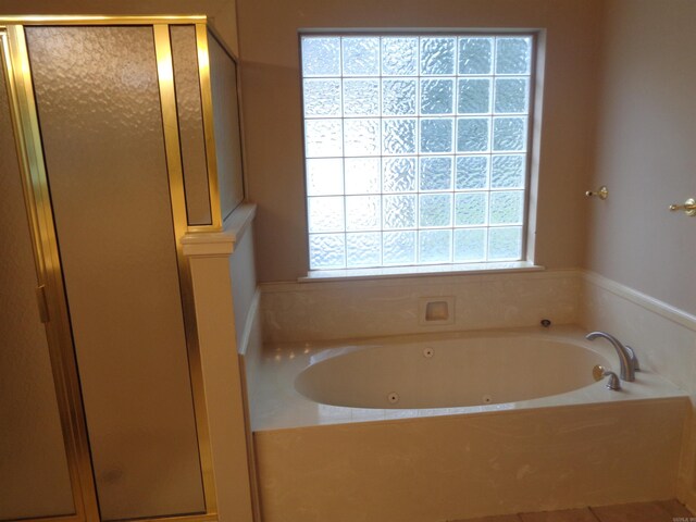 6 Jack Nicklaus Cv, Little Rock, AR 72210 - full bath featuring a tub with jets and a shower stall