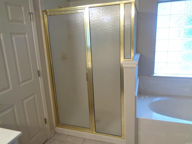 6 Jack Nicklaus Cv, Little Rock, AR 72210 - full bathroom featuring a tub with jets, a shower stall, and tile patterned flooring