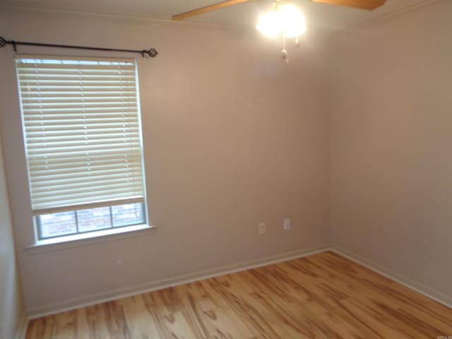 6 Jack Nicklaus Cv, Little Rock, AR 72210 - spare room with ornamental molding, ceiling fan, light wood-style flooring, and baseboards