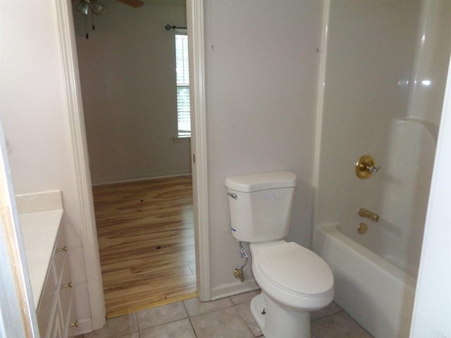 6 Jack Nicklaus Cv, Little Rock, AR 72210 - bathroom featuring toilet, tile patterned flooring, bathing tub / shower combination, vanity, and a ceiling fan