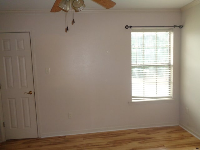 6 Jack Nicklaus Cv, Little Rock, AR 72210 - spare room featuring ceiling fan, healthy amount of natural light, crown molding, and light wood-style flooring