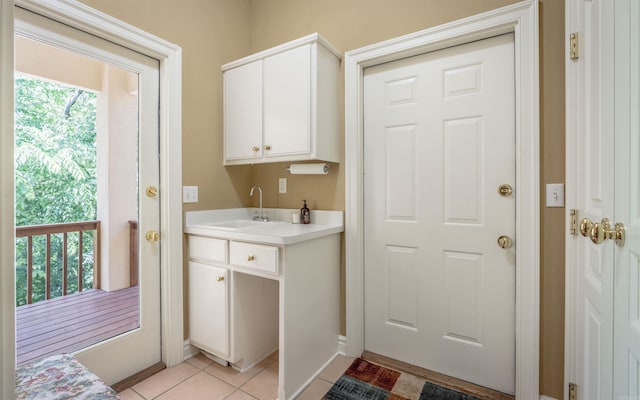 12 Sacedon Trce, Hot Springs Village, AR 71909 - washroom with a sink, light tile patterned floors, and baseboards