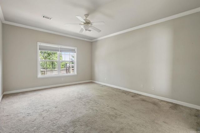 113 Shady Dr, Maumelle, AR 72113 - spare room with a ceiling fan, ornamental molding, baseboards, and carpet floors