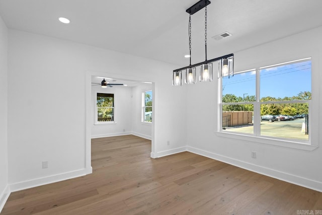 2501 S Maple St, Little Rock, AR 72204 - unfurnished dining area with baseboards, wood finished floors, a ceiling fan, and recessed lighting