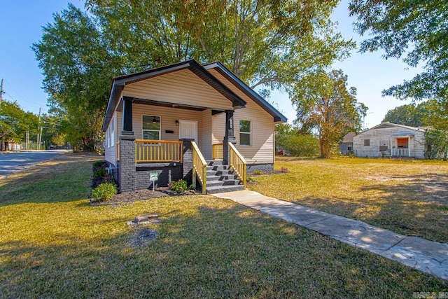 2501 S Maple St, Little Rock, AR 72204 - view of front facade with covered porch and a front yard