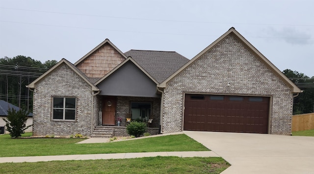 92 Hudson Dr, Sheridan, AR 72150 - craftsman-style home with a garage, driveway, a front yard, and brick siding
