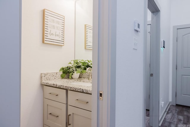92 Hudson Dr, Sheridan, AR 72150 - bathroom with vanity and wood finished floors