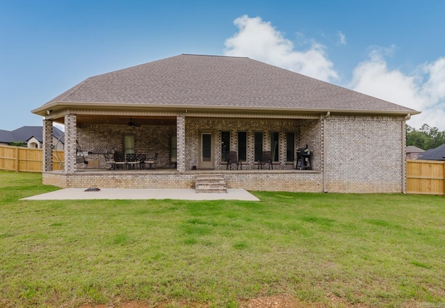 92 Hudson Dr, Sheridan, AR 72150 - back of property with brick siding, a patio, a ceiling fan, and a shingled roof