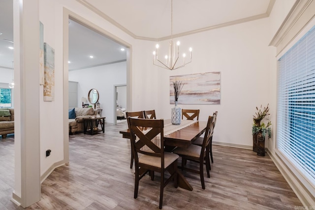 92 Hudson Dr, Sheridan, AR 72150 - dining space featuring a chandelier, wood finished floors, ornamental molding, baseboards, and recessed lighting