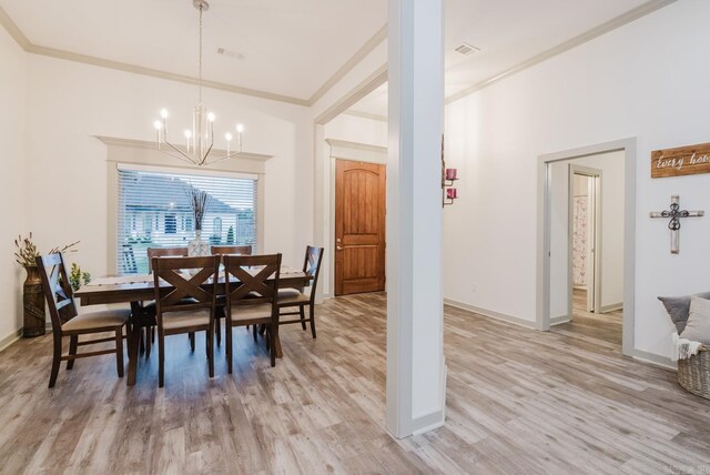 92 Hudson Dr, Sheridan, AR 72150 - dining area featuring a chandelier, light wood finished floors, ornamental molding, and baseboards